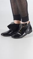 lackleder shuh mit druckknopf